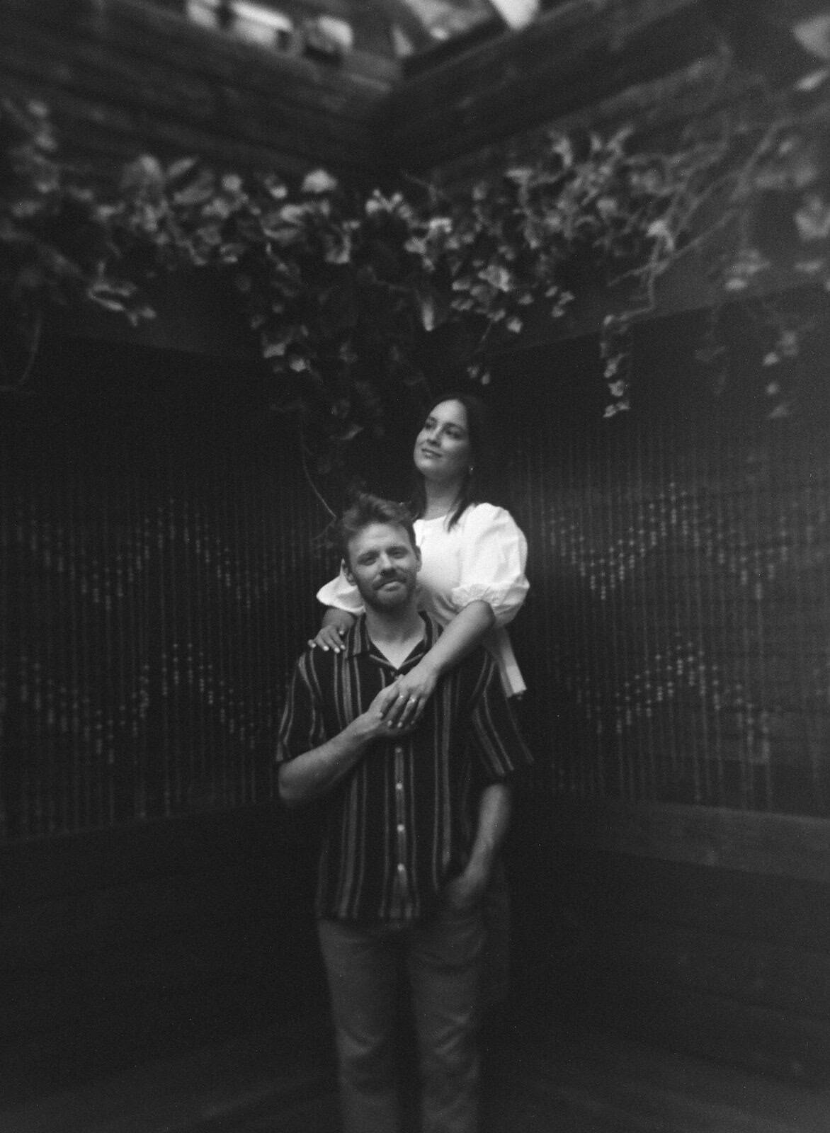 black and white film image in little italy toronto during a couple's session
