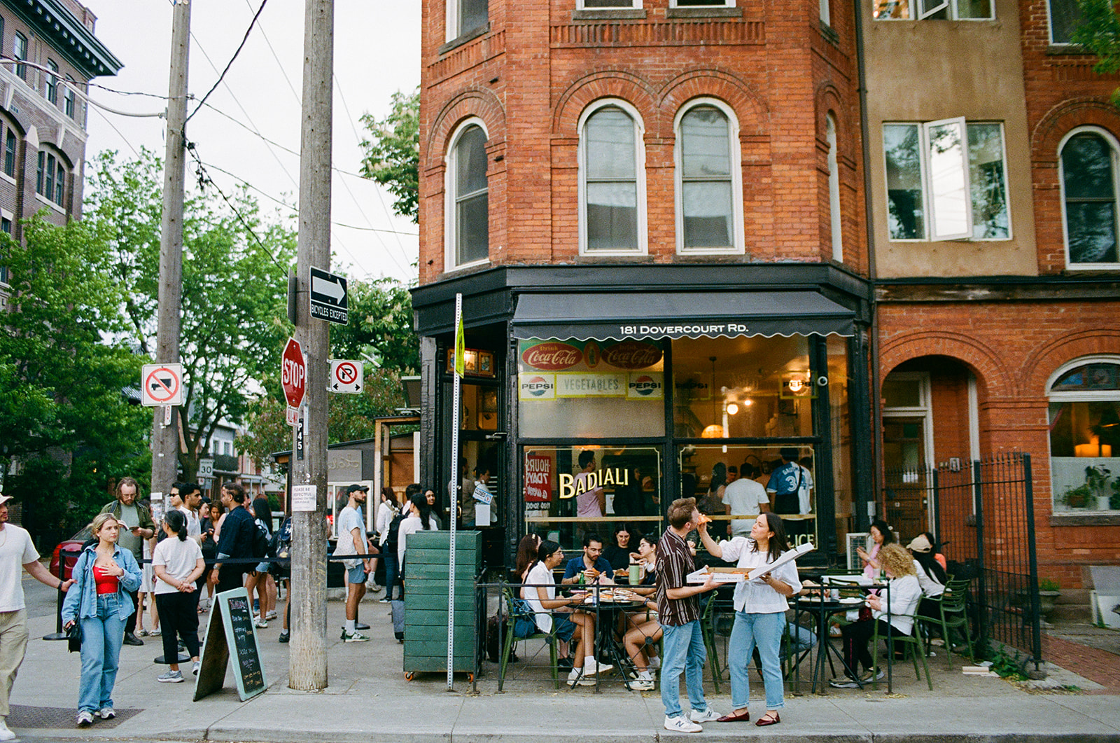 Engagement shoot with vintage film tones near Pizzeria Badiali Bloor and Ossington Toronto