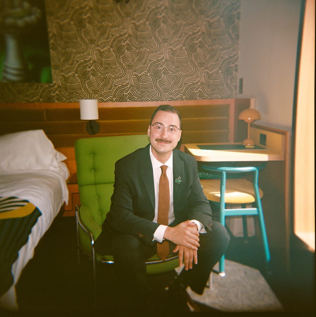 Holga film shot of a groom in suite at the Drake hotel wedding toronto