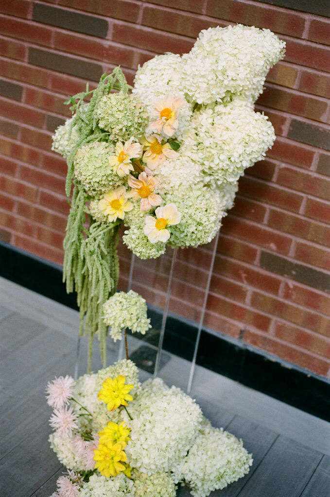 floral design on film rooftop wedding ceremony the drake