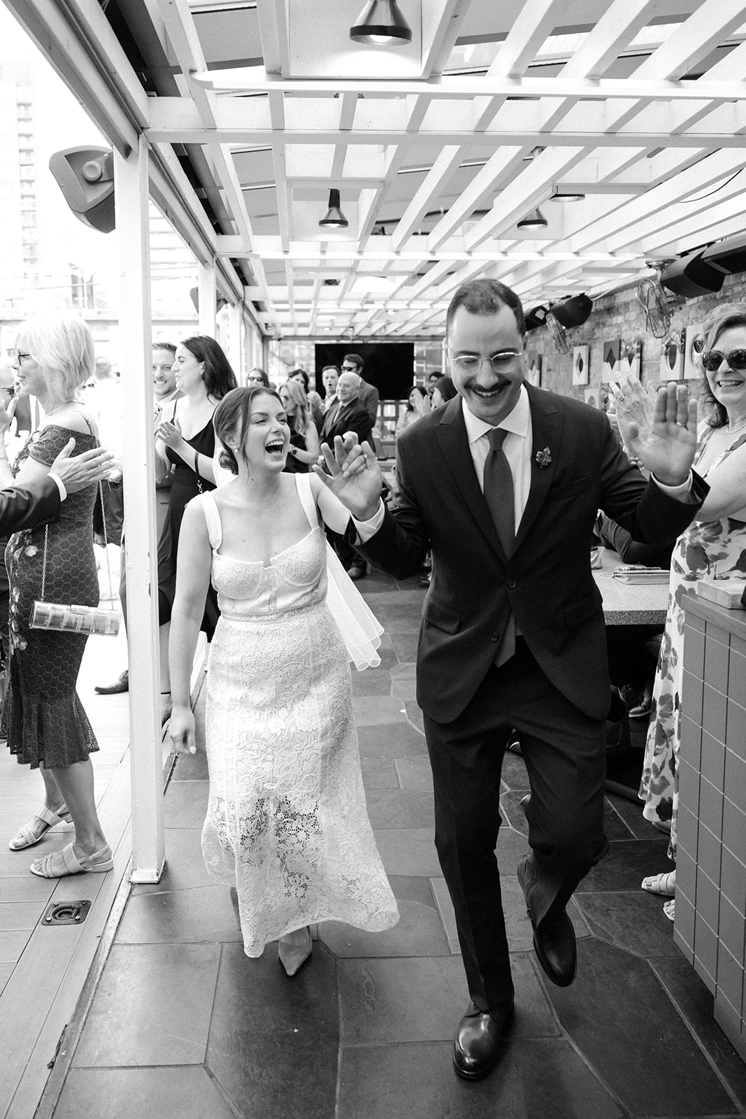bride and groom exit ceremony on the roof of Drake Hotel Toronto